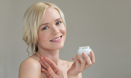 Woman with Moisturizer